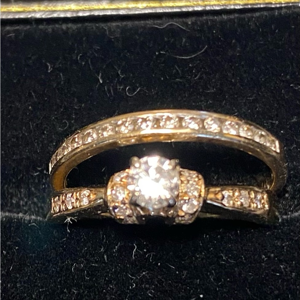 Delicate 14k engagement ring with 10k wedding band